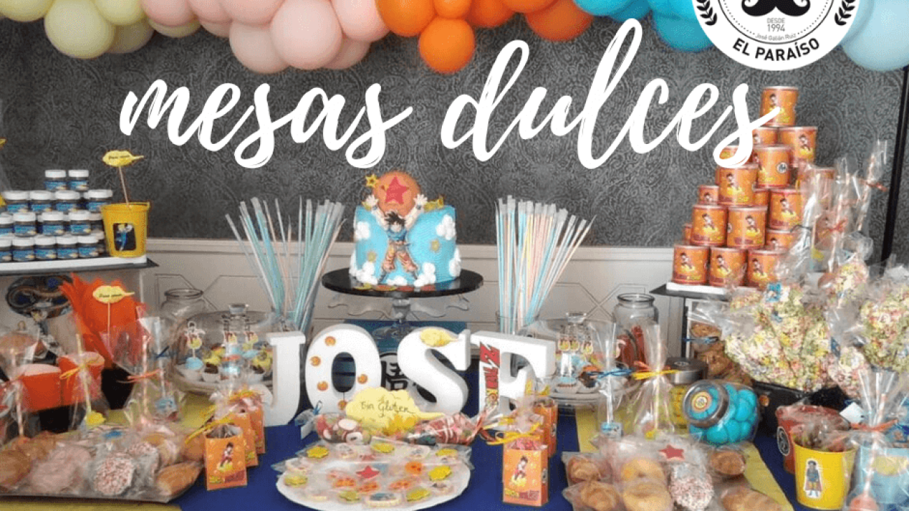 Mesa dulce para comunión decorada con globos, flores, chucherías y una tarta personalizada. Ideal para sorprender a los invitados en este día tan especial